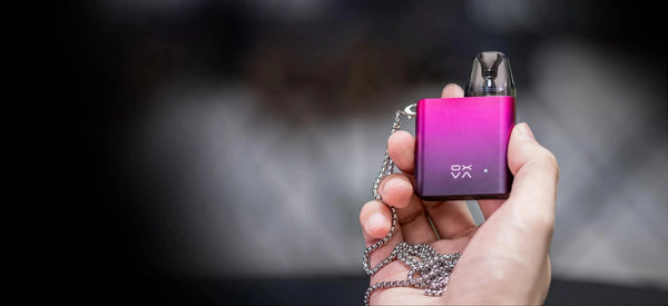 OXVA XLIM SQ 25W pod kit, compact hardware device with sleek design and replaceable pod for vaping.