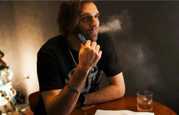 Vaporesso Vibe Pod System hardware with sleek design, compact size, and integrated mouthpiece for vaping convenience.