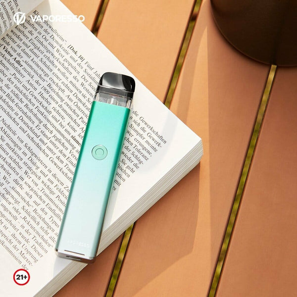 Vaporesso XROS 3 Pod System hardware with sleek design, showing the compact vape device and replaceable pod in black finish.